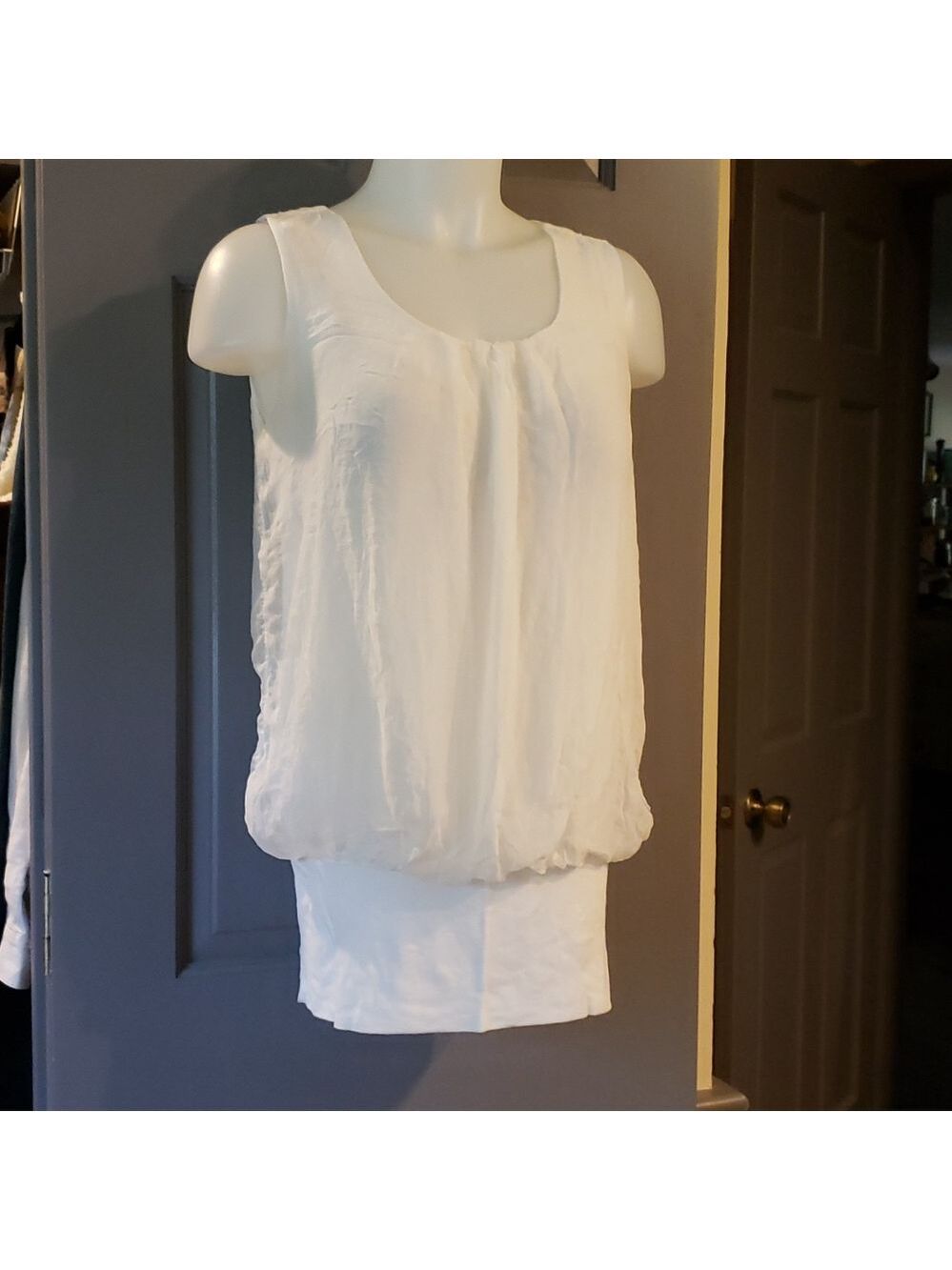 Elena Baldi S top sleeveless